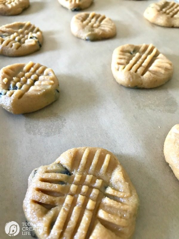 unbaked 4 Ingredient Peanut Butter Cookies on a baking sheet