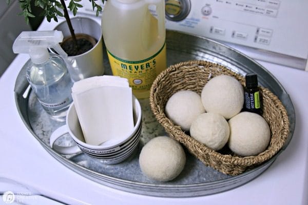 Laundry Supplies in tray on top of washing machine