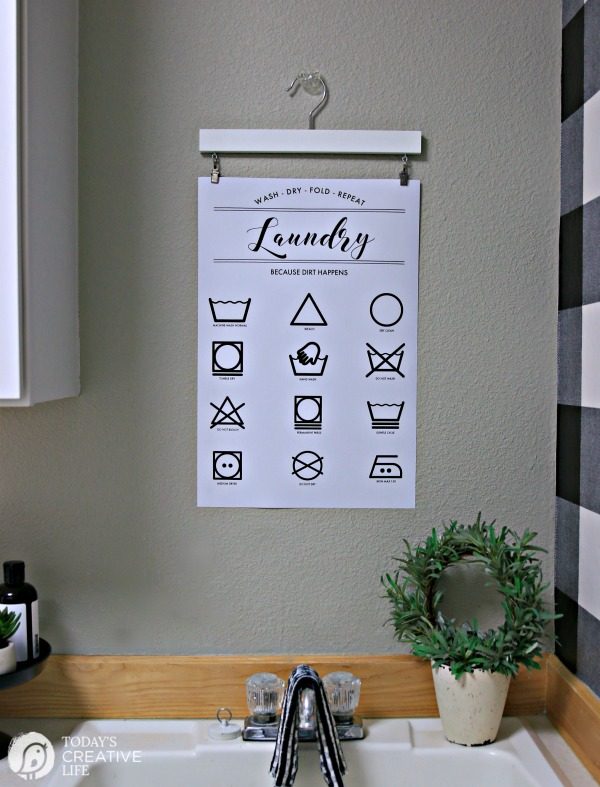 Laundry Cleaning Symbols Printable hanging on laundry room wall