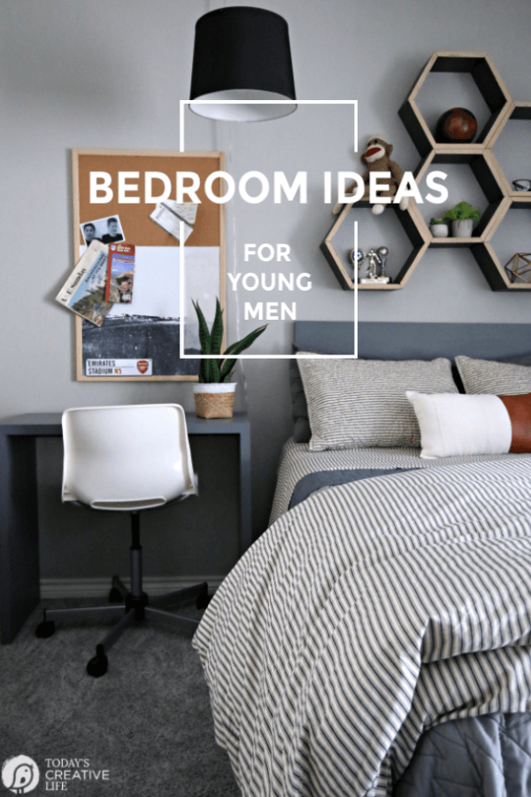 Bedroom decorated in greys for young men. 