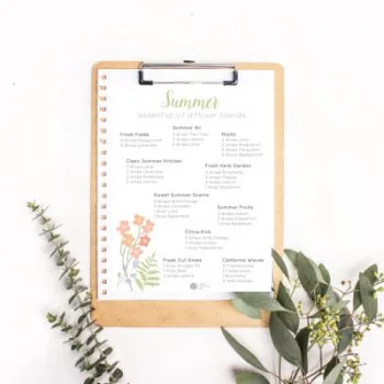 Clipboard with essential oil diffuser blend recipes attached.