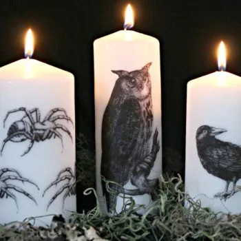 white candles with halloween images