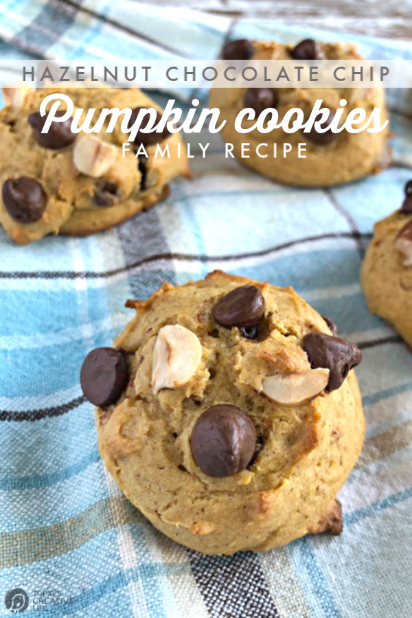 Pumpkin cookies with chocolate chips on top.