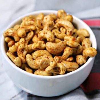 Spiced cashews in a white bowl