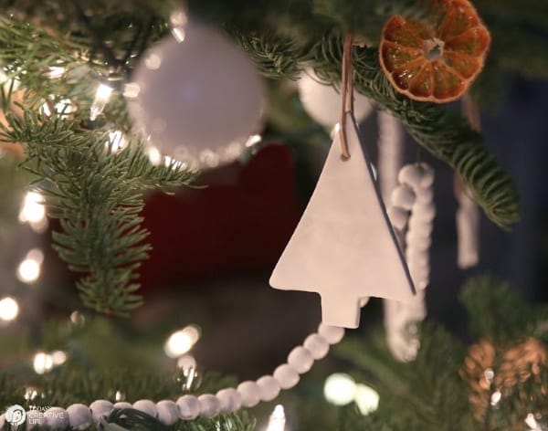 White Tree Clay Ornament hanging on Christmas Tree