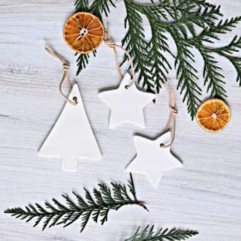 white clay christmas ornaments in the shape of a tree and star