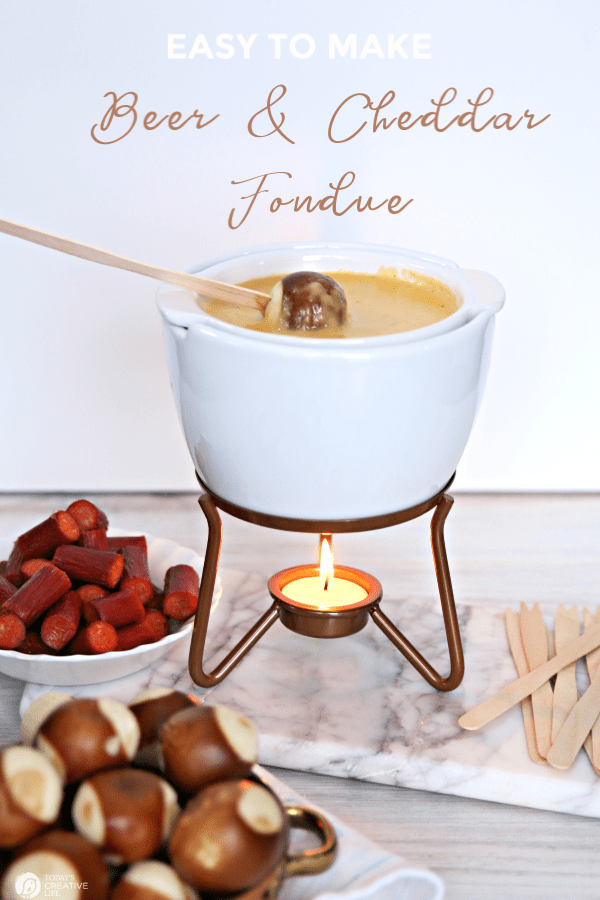 Cheese fondue pot with pretzel bites