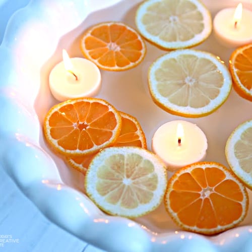 sliced floating lemons and oranges