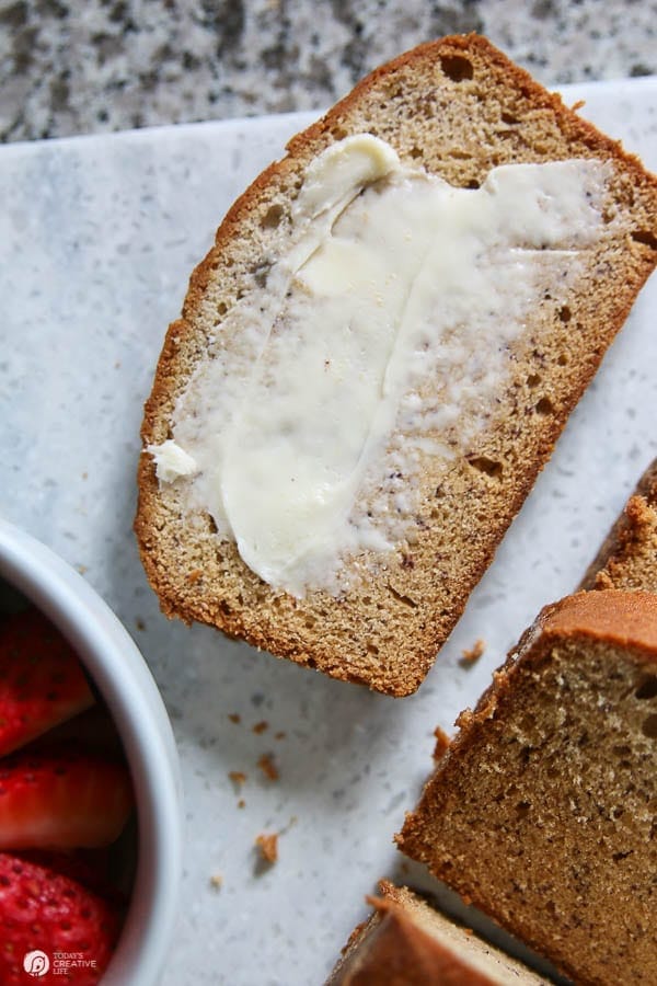 Slice of banana bread with butter