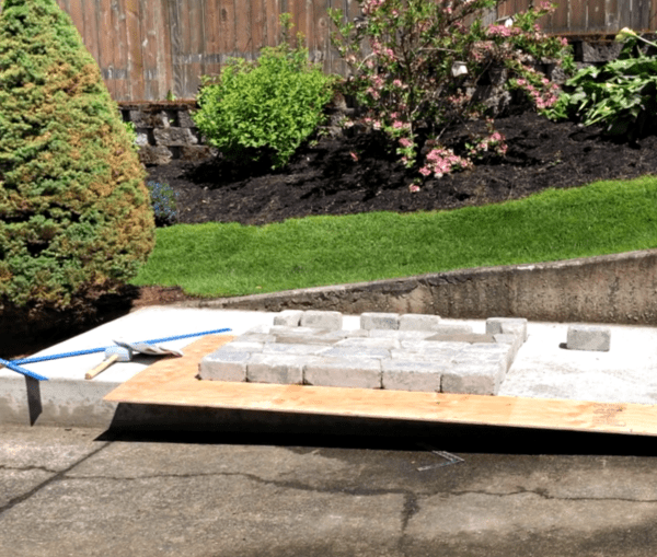 Backyard fireplace concrete pad