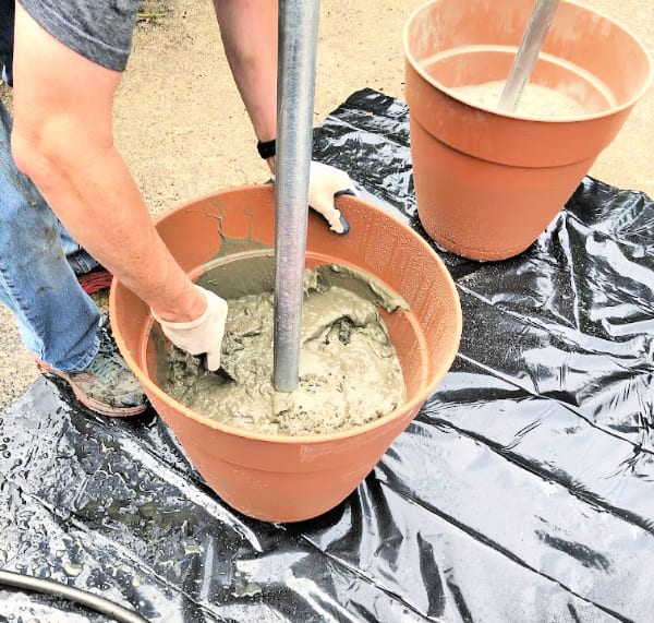 Stirring wet concrete