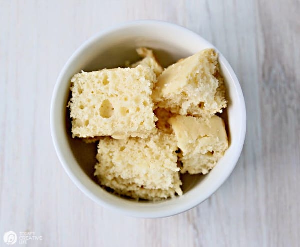 white bowl with cubed white cake