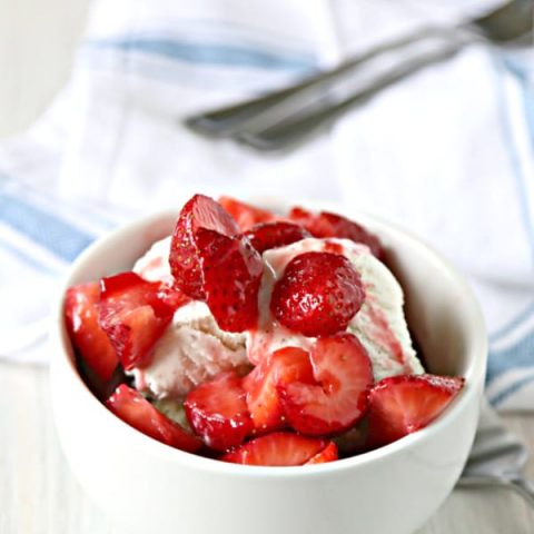white bowl with strawberries