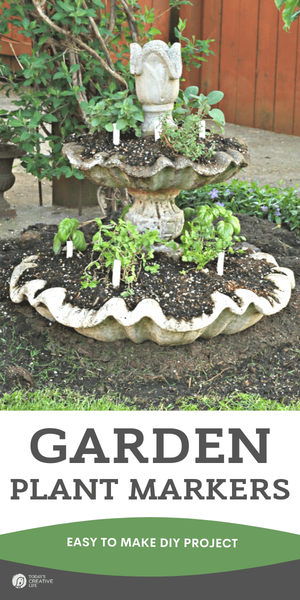 Photo of old concrete fountain with plants planted.