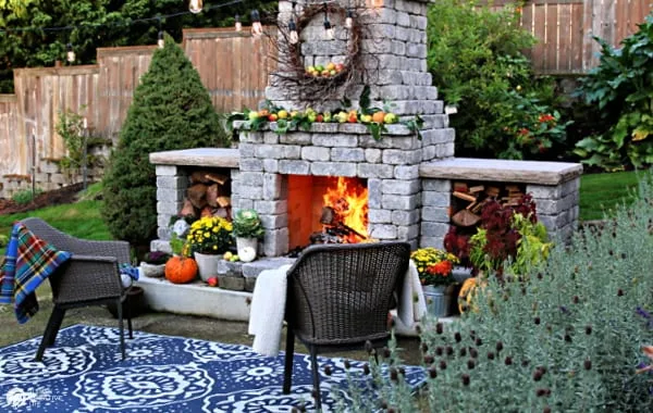 Decorating Ideas for Fall with an outdoor fireplace.