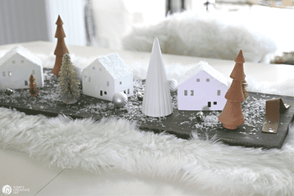 Christmas table centerpiece with wood trees and DIY paper houses