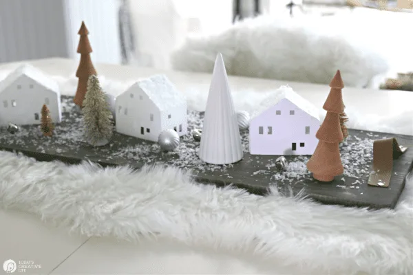 Christmas table centerpiece with wood trees and DIY paper houses