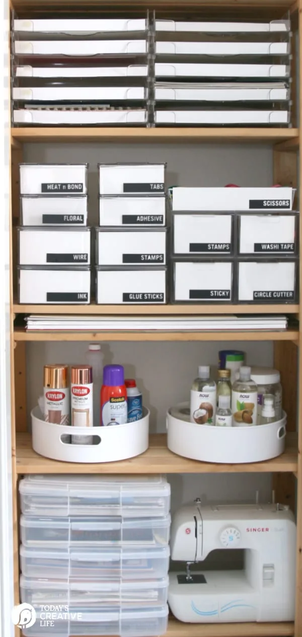 Organized Craft Supplies in a closet. 