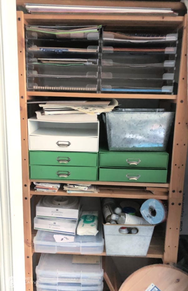 unorganized Craft Supplies in a craft closet