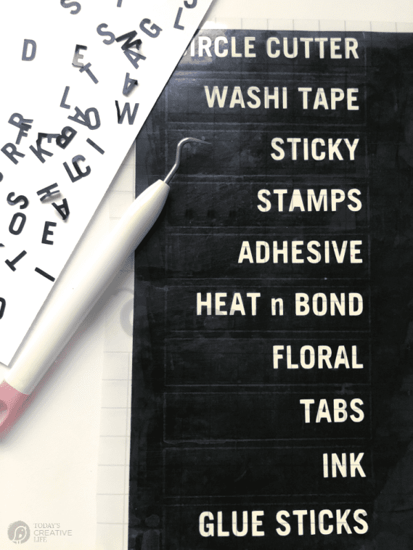 Black Labels with white writing to organize a craft room