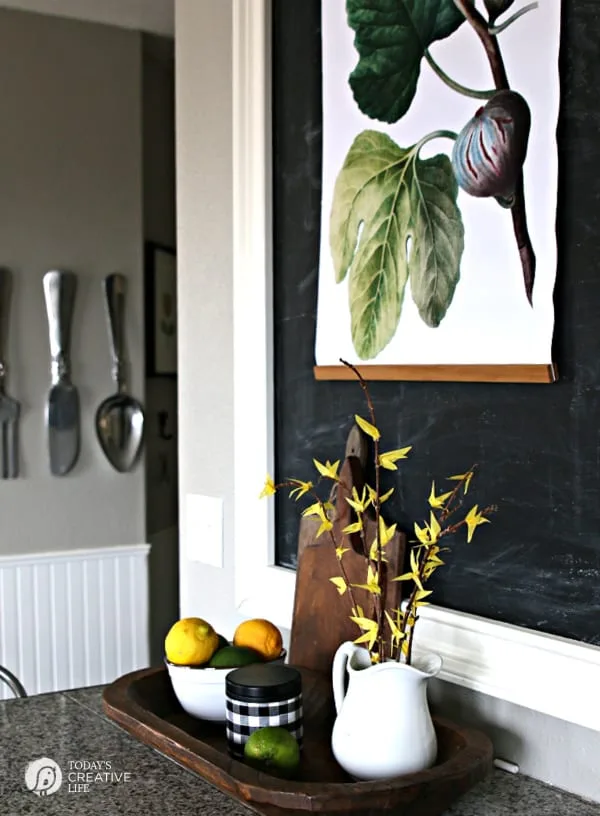 How to Make DIY Tissue Paper Flowers for faux forsythia branches and blooms. TodaysCreativeLife.com Decorated Kitchen for Spring with DIY Faux Forsythia Branches