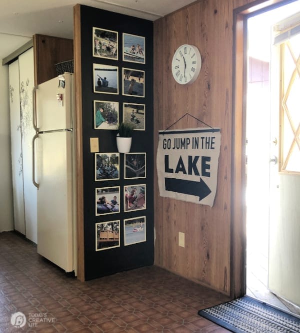 DIY for Wall Decor hanging on wall. Drop Cloth Canvas wall hanging that says Go Jump In the Lake.