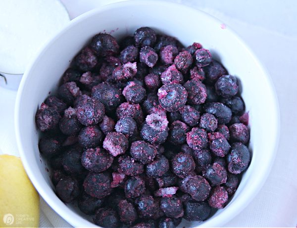 Recipe for Frozen Blueberries | White bowl with frozen blueberries