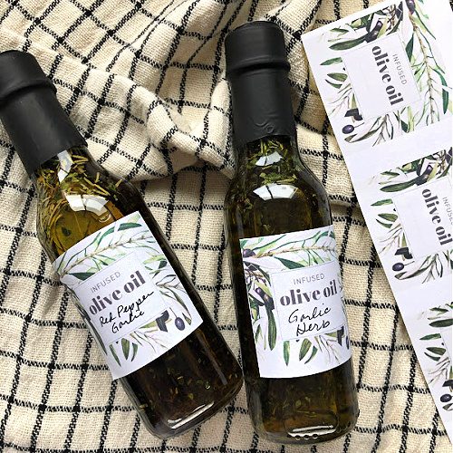 two bottles of infused olive oil - how to infuse olive oil recipe