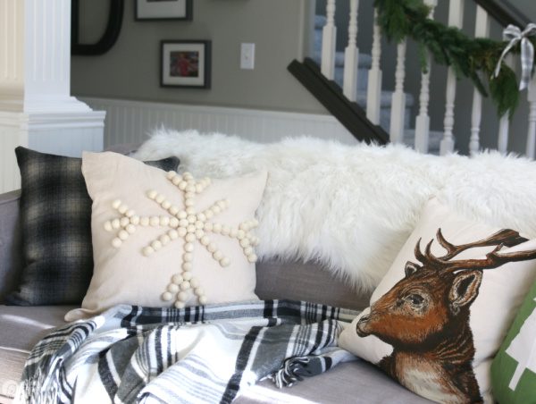 Pillows on sofa, all winter theme.