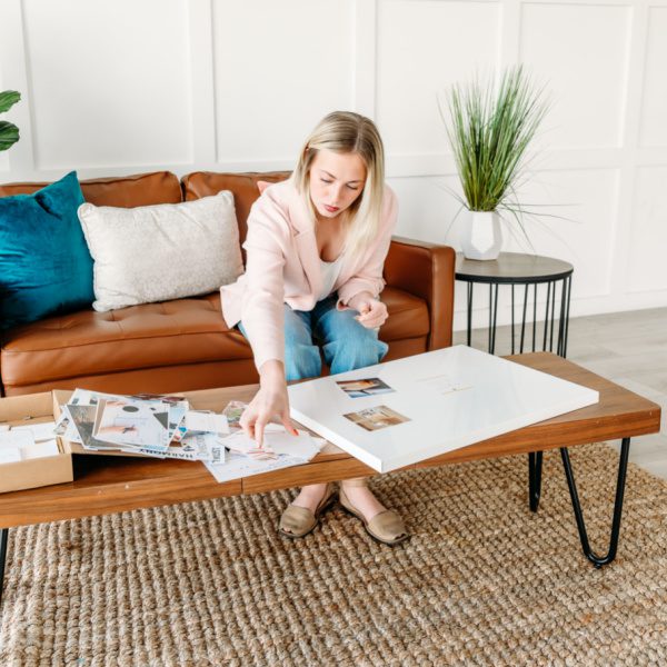 Woman working on making her vision board