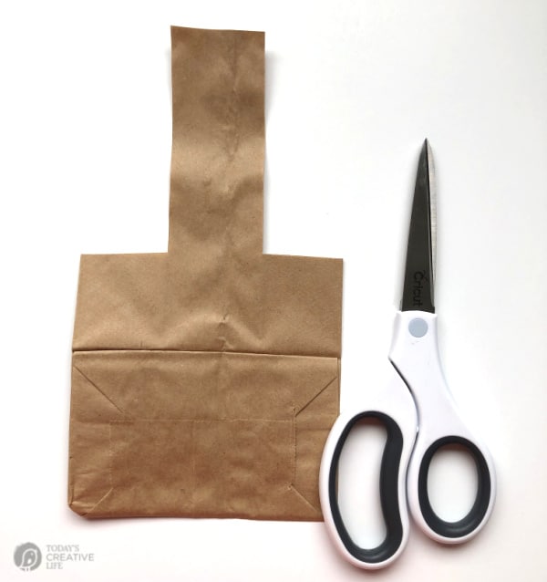 Paper Bag Easter Basket | Scissors and Paper Bag cut to make an Easter Basket