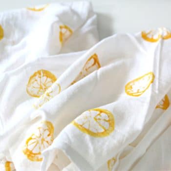 White tea towels with yellow lemon shapes stamped