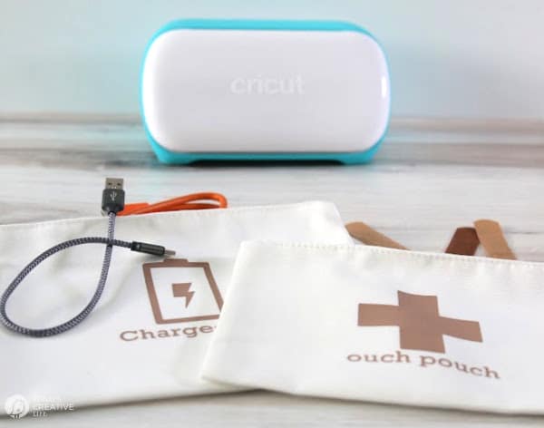 What is a Cricut? Make simple projects like these cosmetic bags turned into a first aid kit and a charging cord organizer.