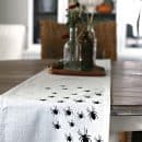 Spider table runner with black spiders