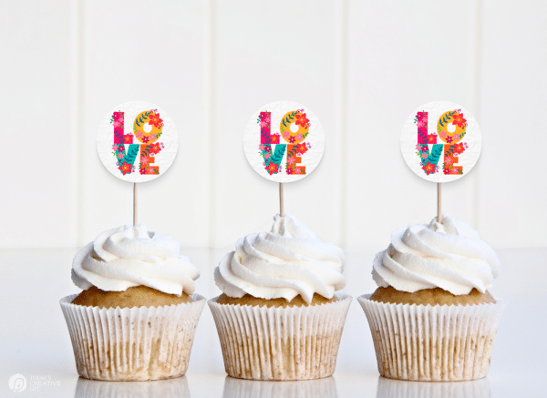 vanilla cupcakes with colorful LOVE cupcake toppers