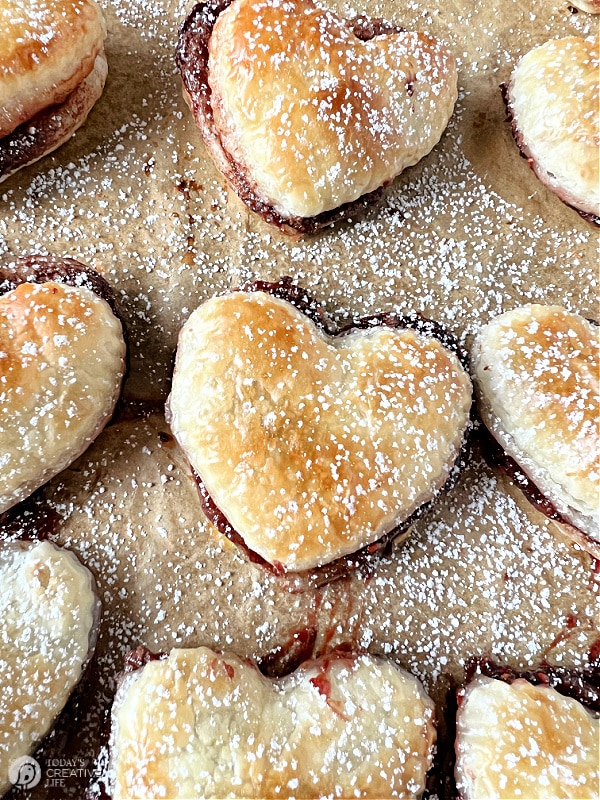 Baked golden brown puff pasty hearts