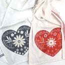 dish towels with red or grey heart design ironed on for DIY Valentine's Day Decor