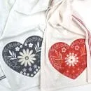 dish towels with red or grey heart design ironed on for DIY Valentine's Day Decor