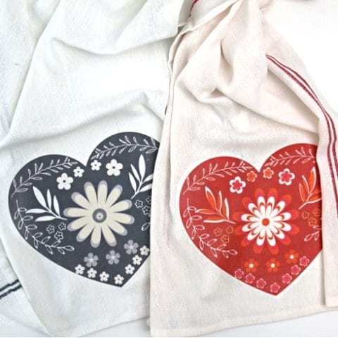 dish towels with red or grey heart design ironed on for DIY Valentine's Day Decor