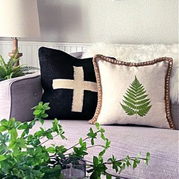 Living room with 2 pillows on sofa. Ideas for home decor with Iron-on transfer ferns