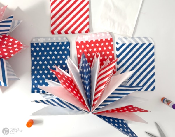 Red and White paper bags for making paper stars