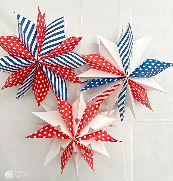 Three Paper Bag Stars made with patriotic paper bags.