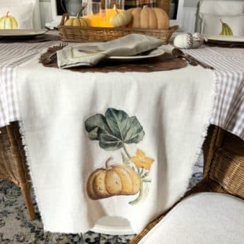 Table Runner on table with a botanical pumpkin design ironed on