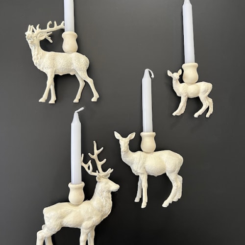 reindeer painted white and made into candles.