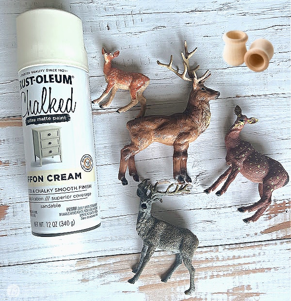 plastic deer, spray paint for making reindeer candle holders. 