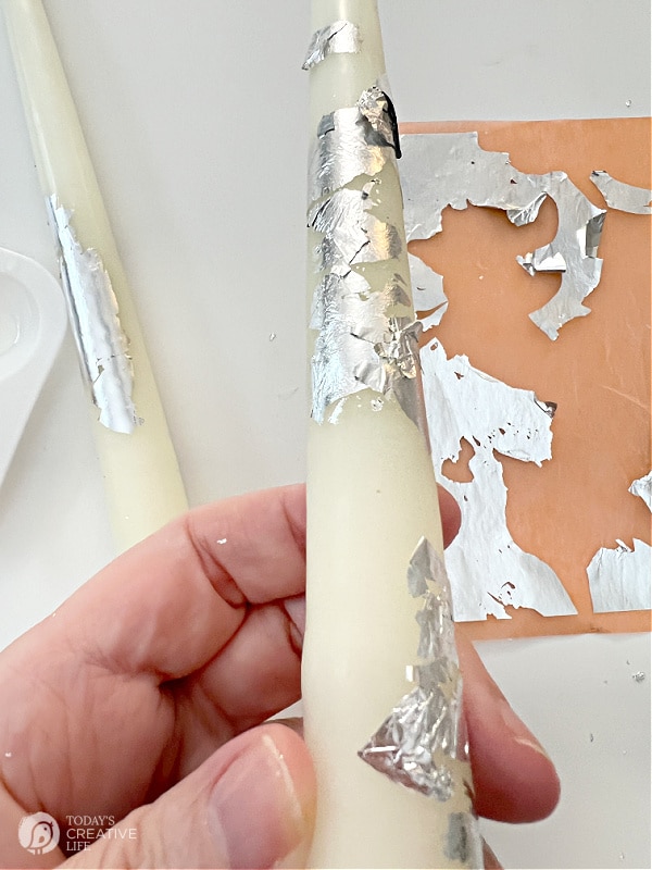 Silver foil sheet on a candle